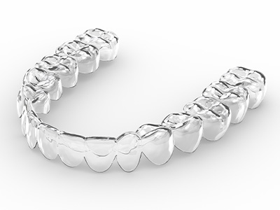 Clear aligner on white surface
