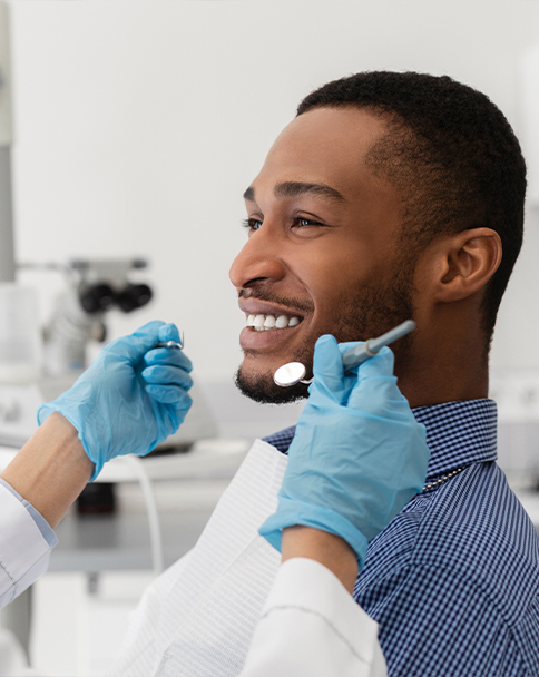 Man smiling during preventive dentistry checkup