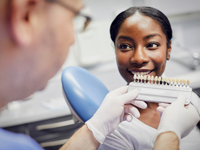 Mesquite patient comparing teeth stain types 