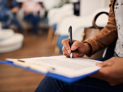 Mesquite patient signing up for in-house membership plan