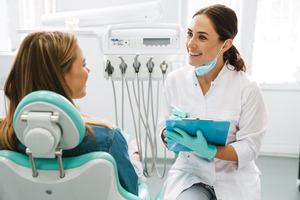 Patient talking to a dentist